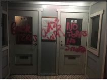 Crude graffiti sprayed at the entrance